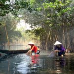 Sustainable Fishing - Women with Fishing Baskets in River