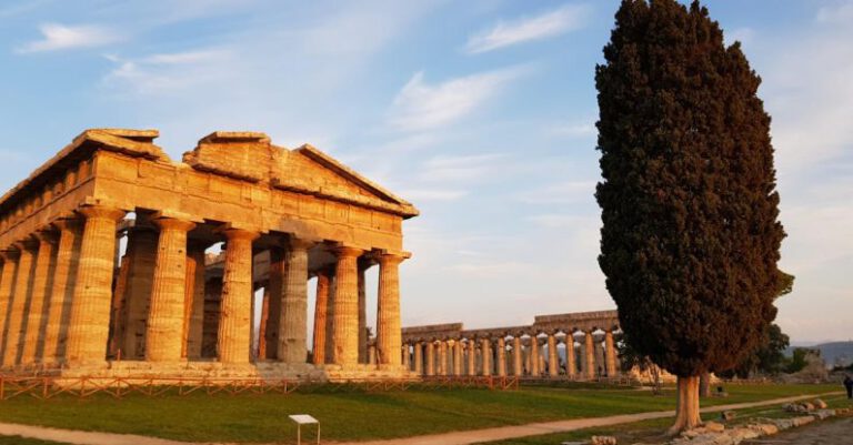 Archaeologists - The ancient greek temple of peleus in the background