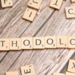 Research Methods - The word methodology spelled out with scrabble tiles